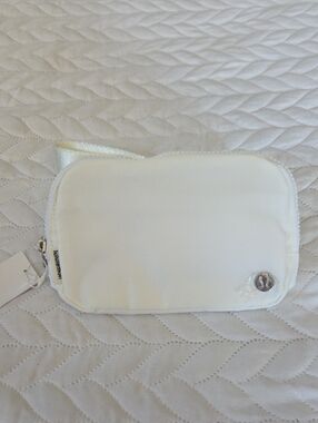 lululemon athletica White Quilted Cosmetic Pouch with Logo Accent
